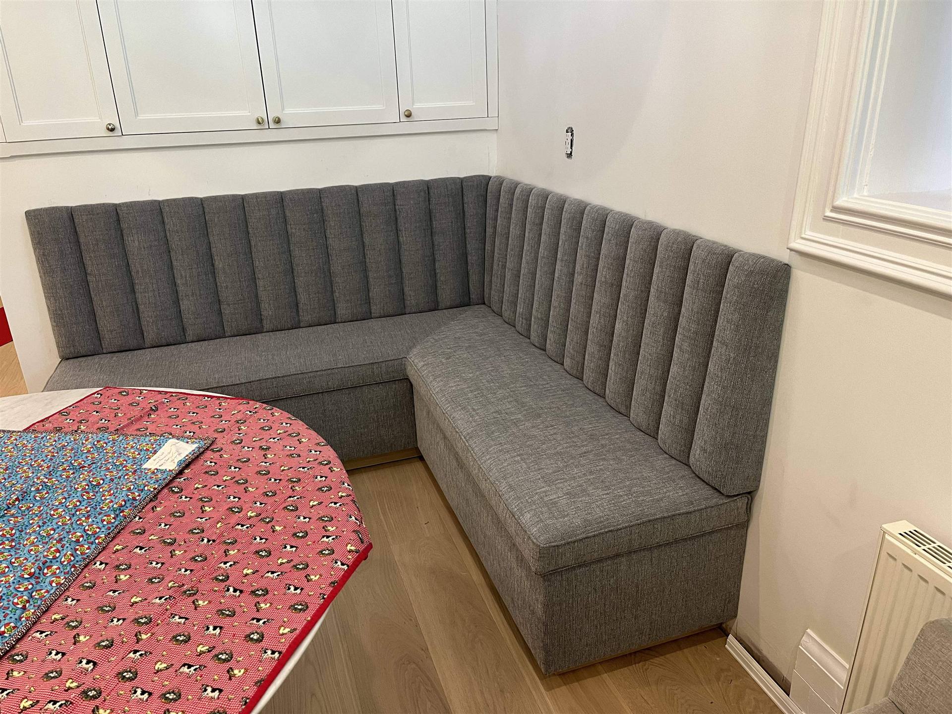 Grey channel corner banquette