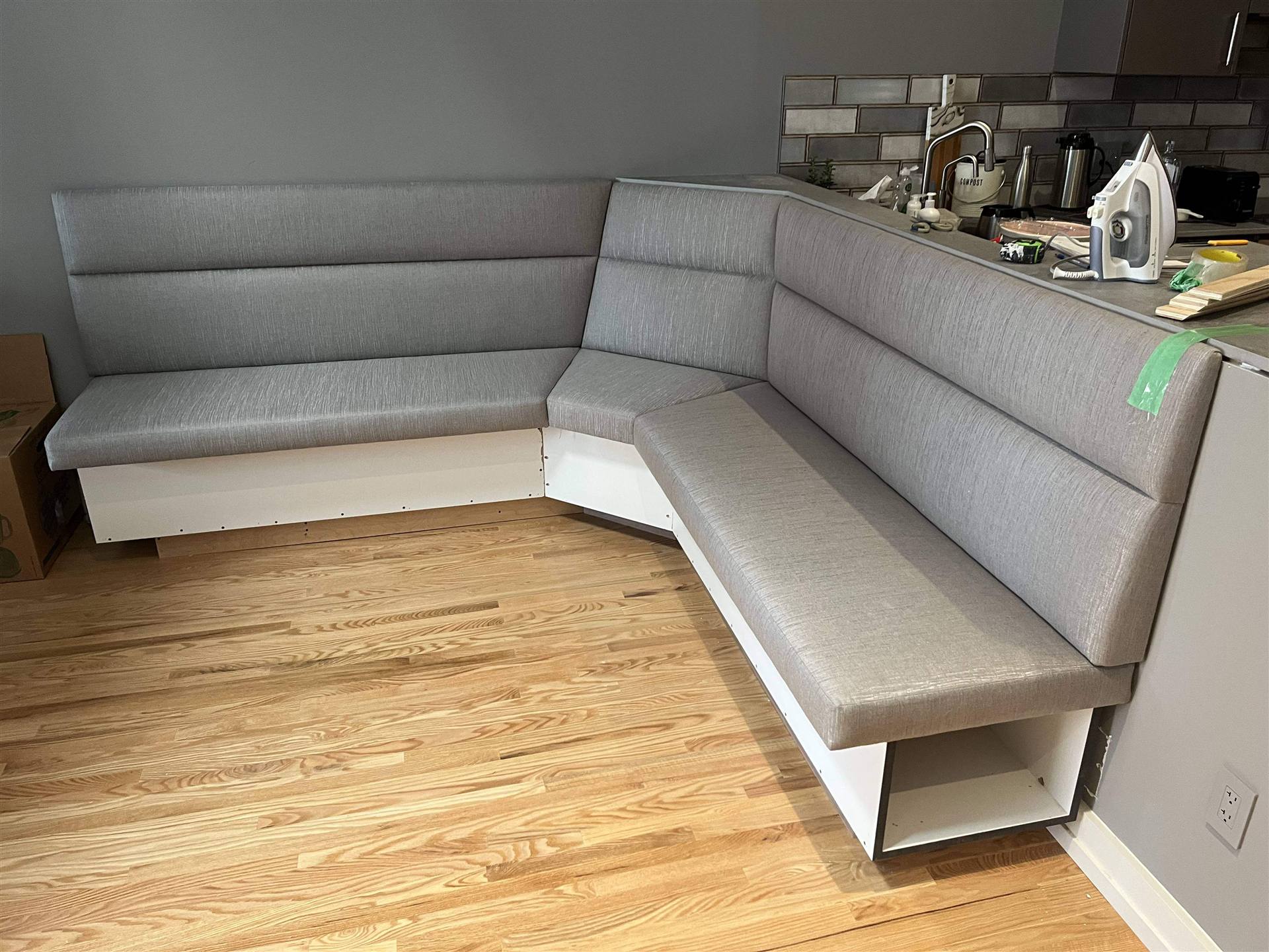 Grey channel corner banquette