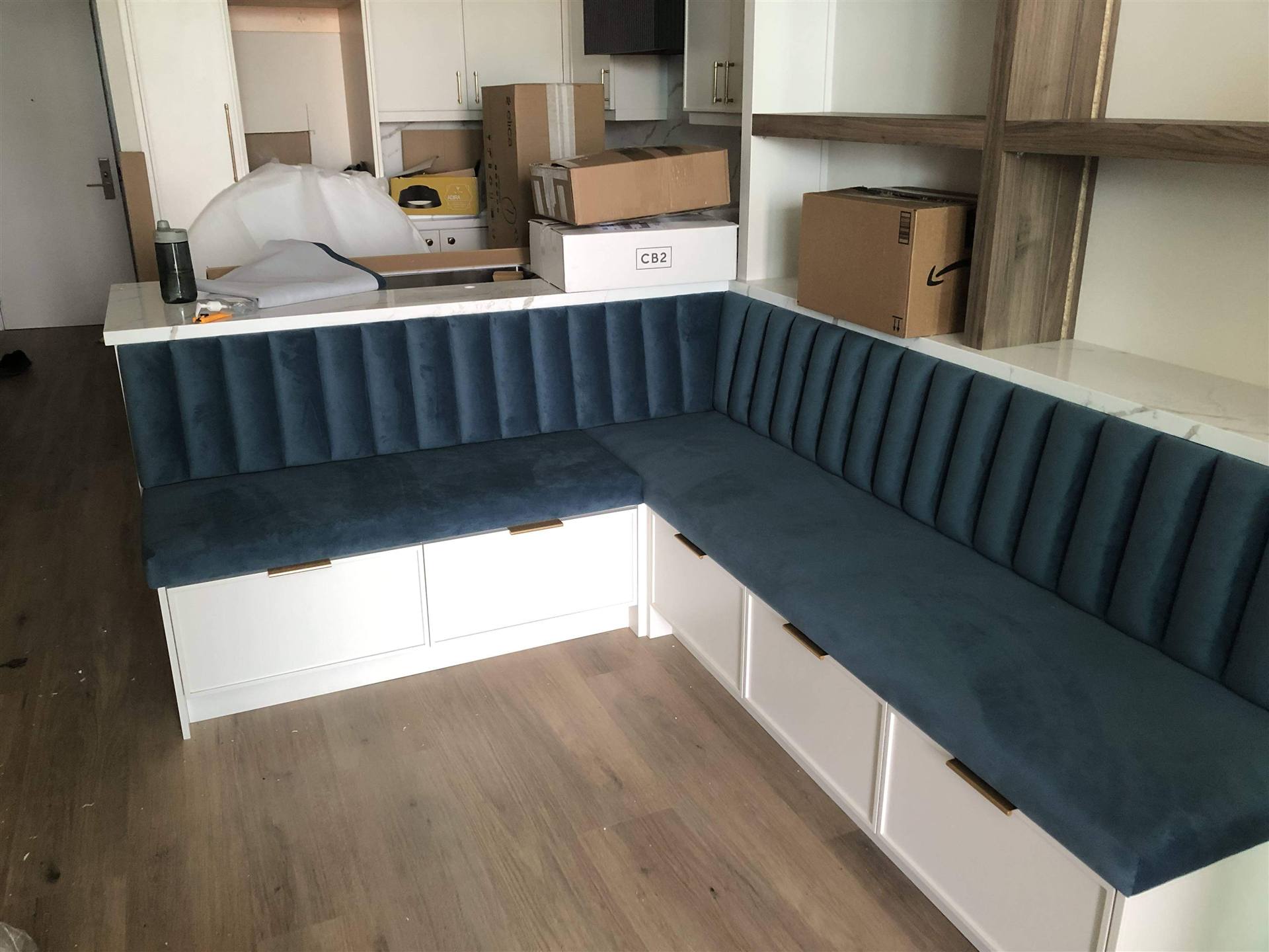 Teal channel L-shaped banquette