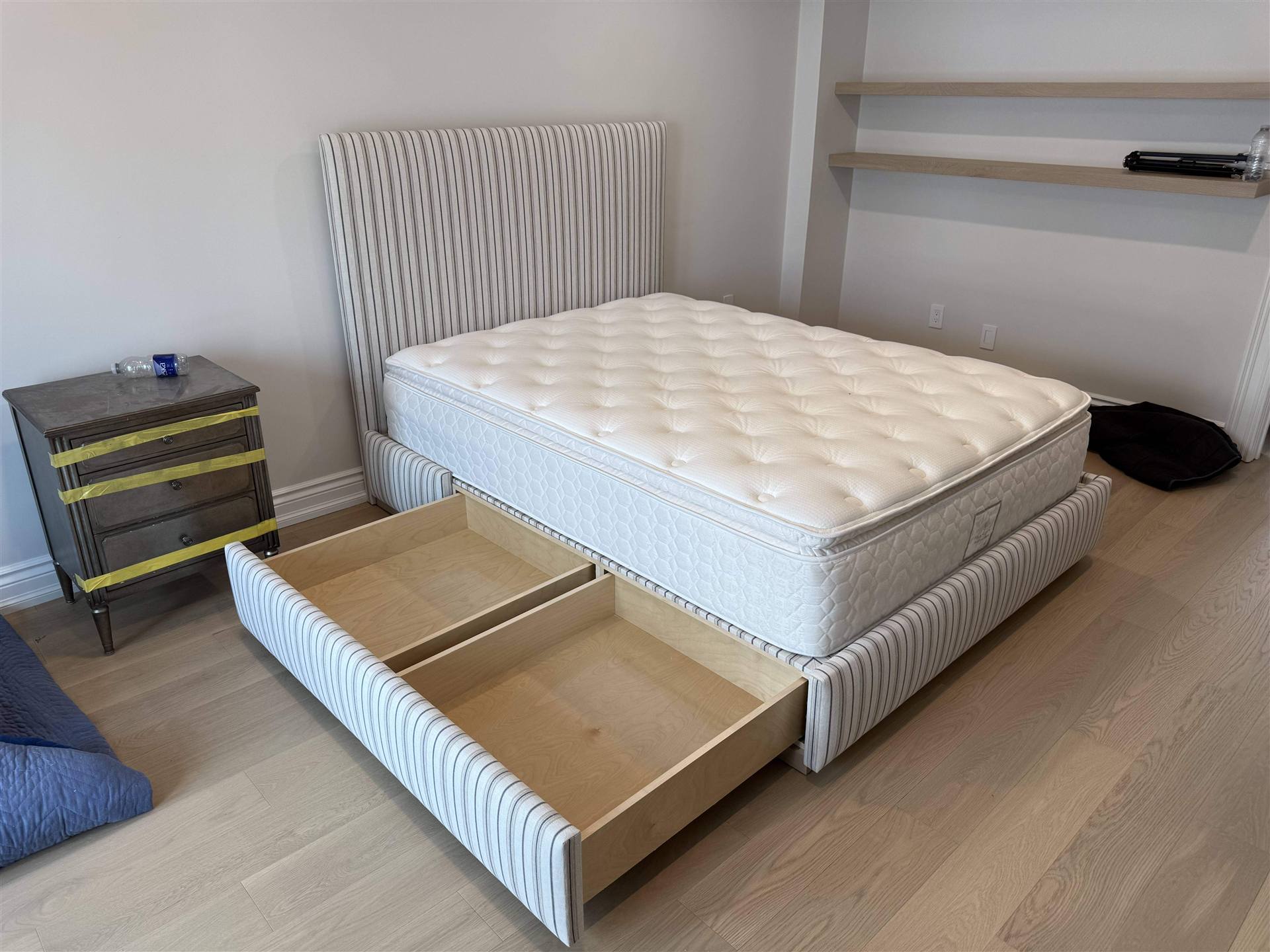 Custom stripe upholstered single bed with open storage drawer