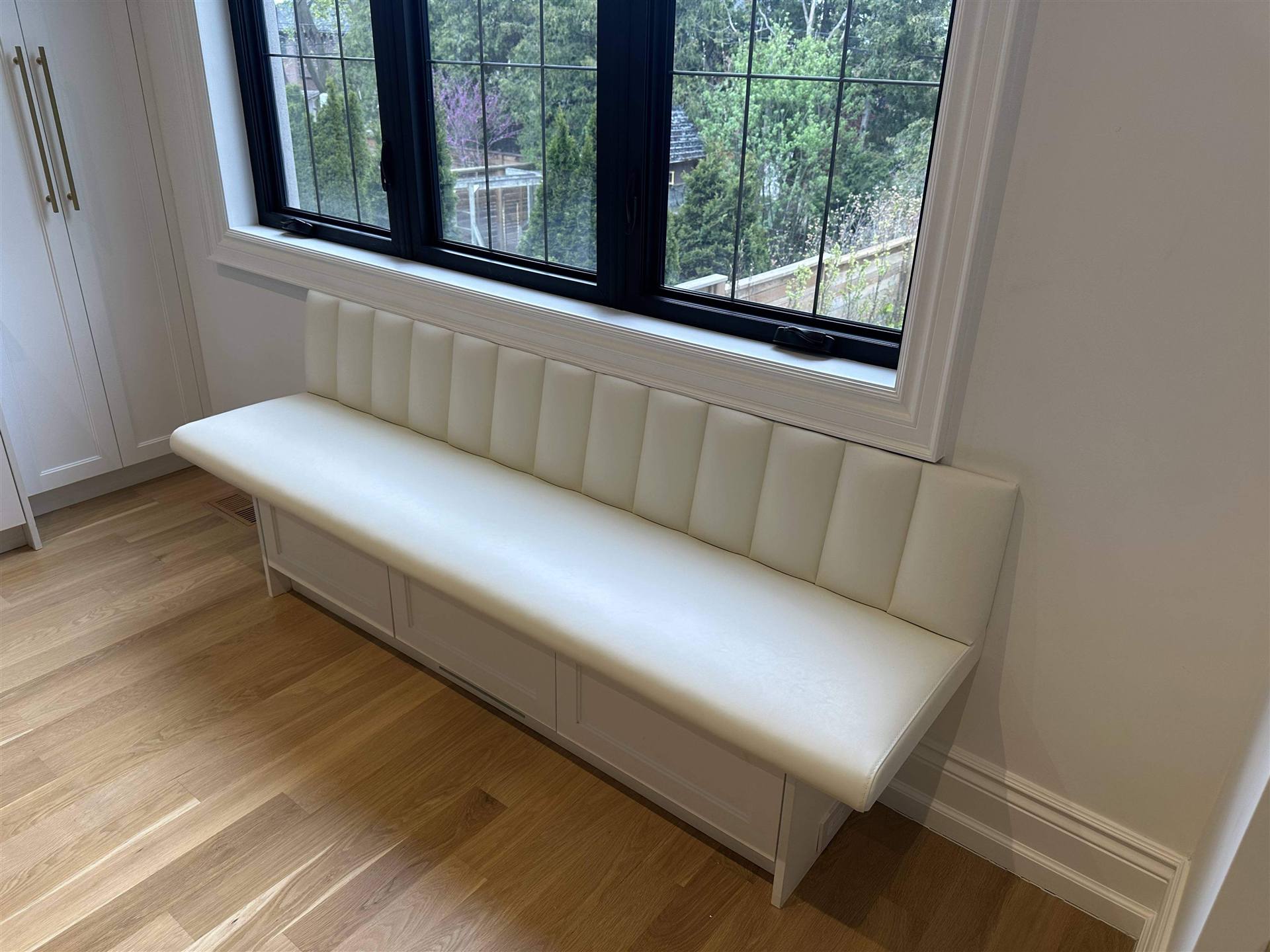 Custom cream channel-tufted window bench seat