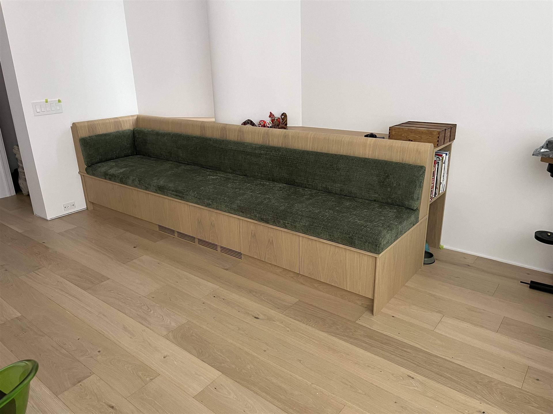Custom long green velvet bench with oak frame and storage