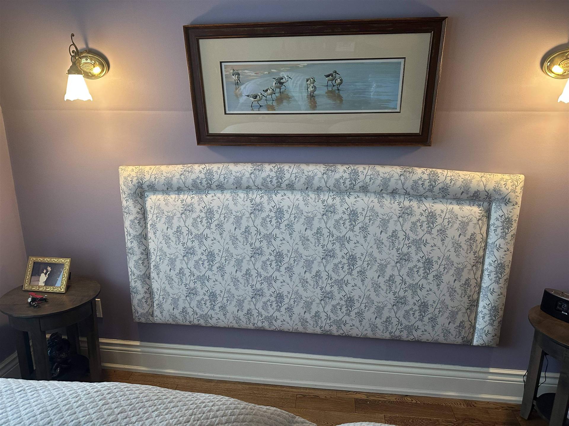 Custom floral upholstered headboard with blue floral toile pattern